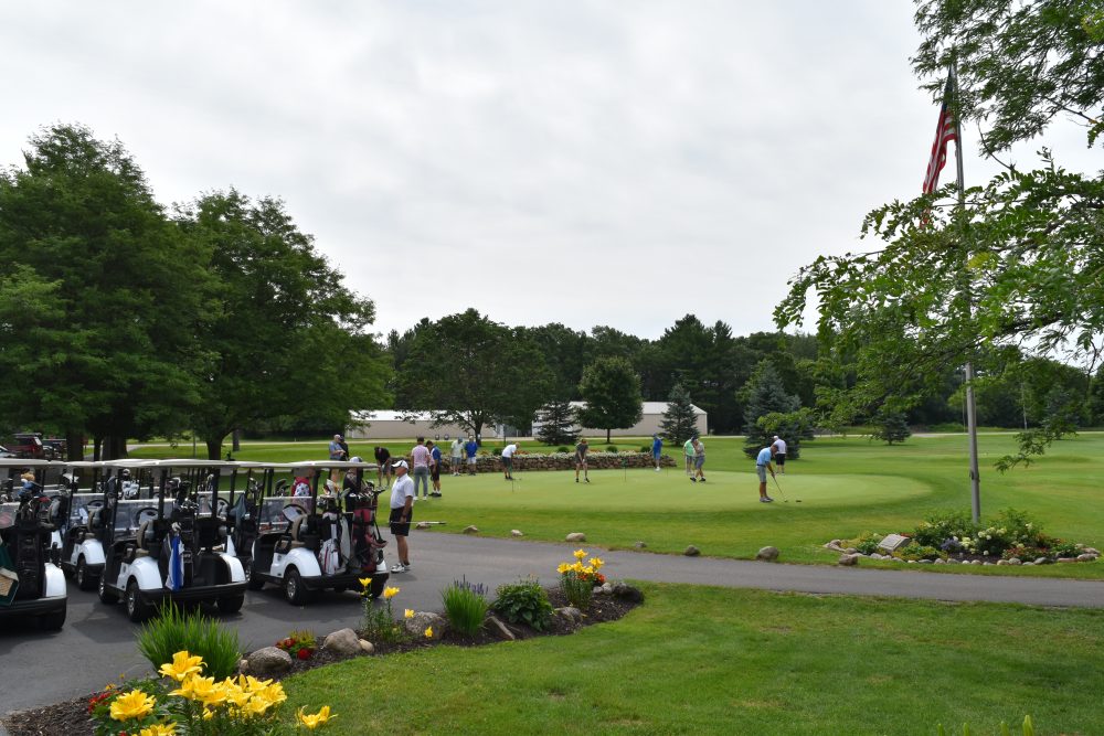 Golfers on the practice green