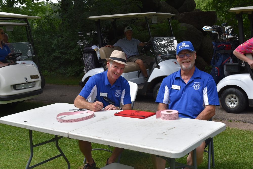 Volunteers sitting at table