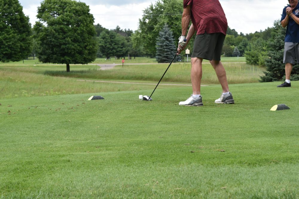 Golfer teed up to hit a marshmallow